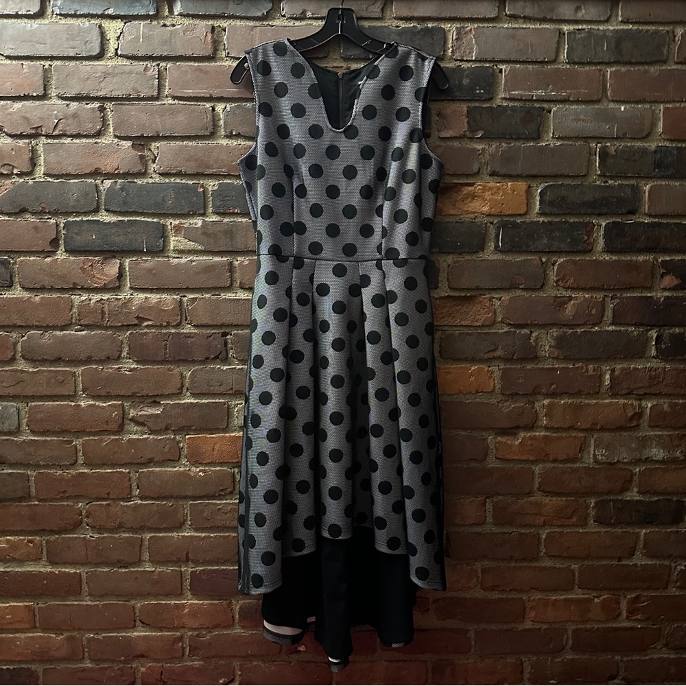 Samuel Dong Sleeveless, V-neckline hi-low mesh overlay polka-dots Zip pockets